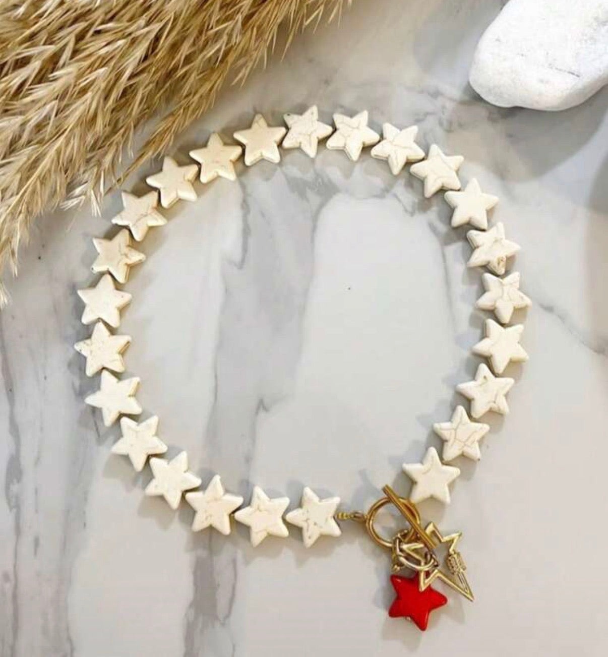 Cream/White Star Toggle Choker with Gold & Red Star Pendants