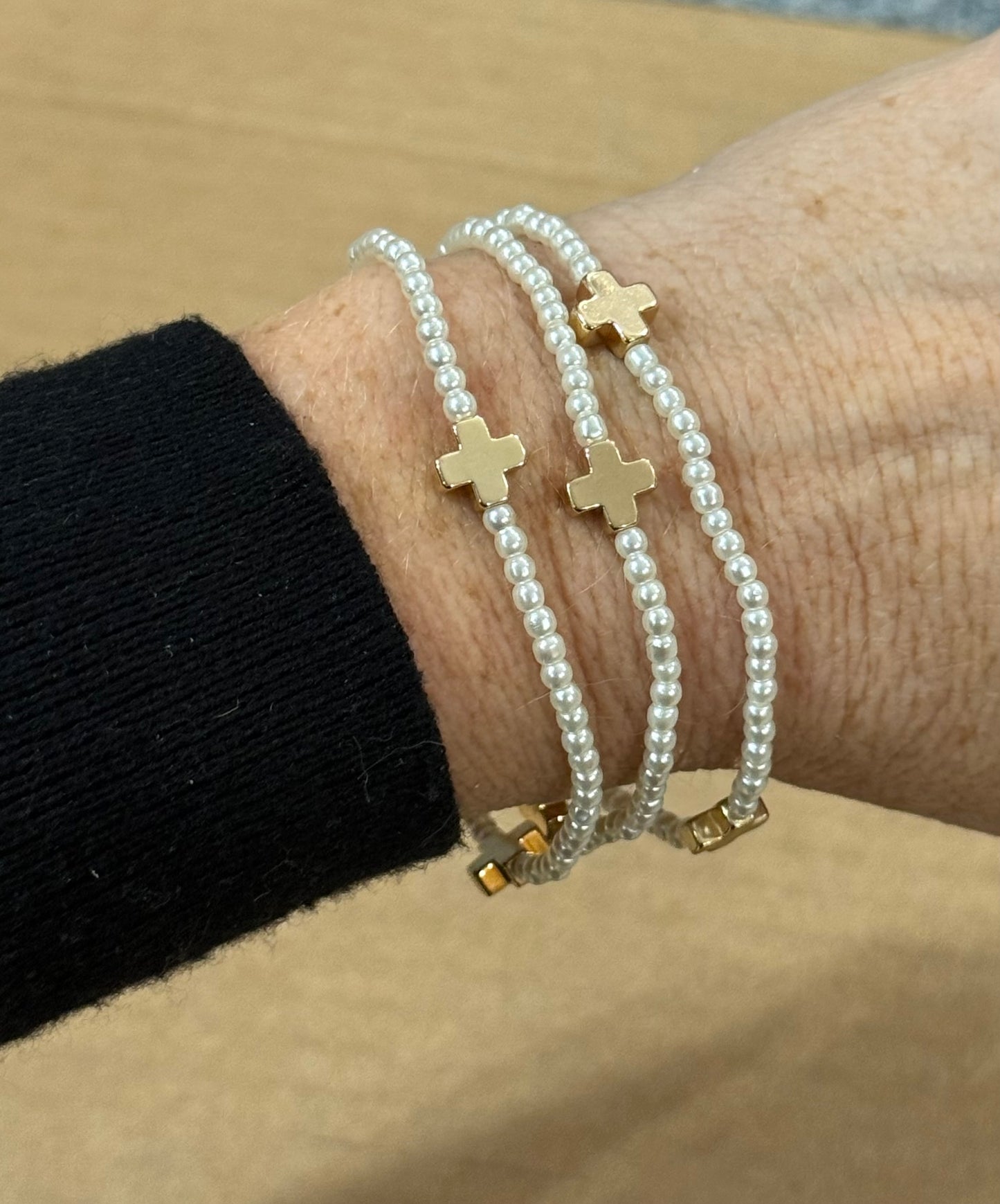 3 pc. Set Pearl Stretch Bracelets with Gold Cross Accents