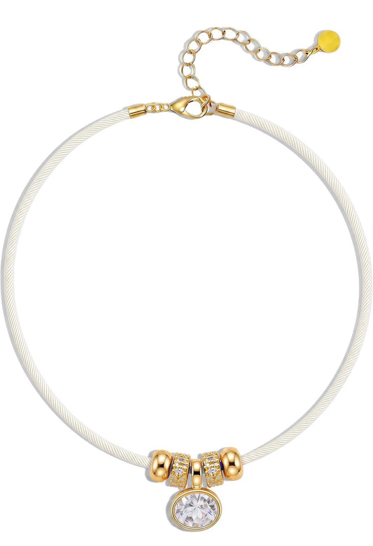 Gold Oval Crystal & Gold Charms on a White/Light Cream Satin Rope Necklace.