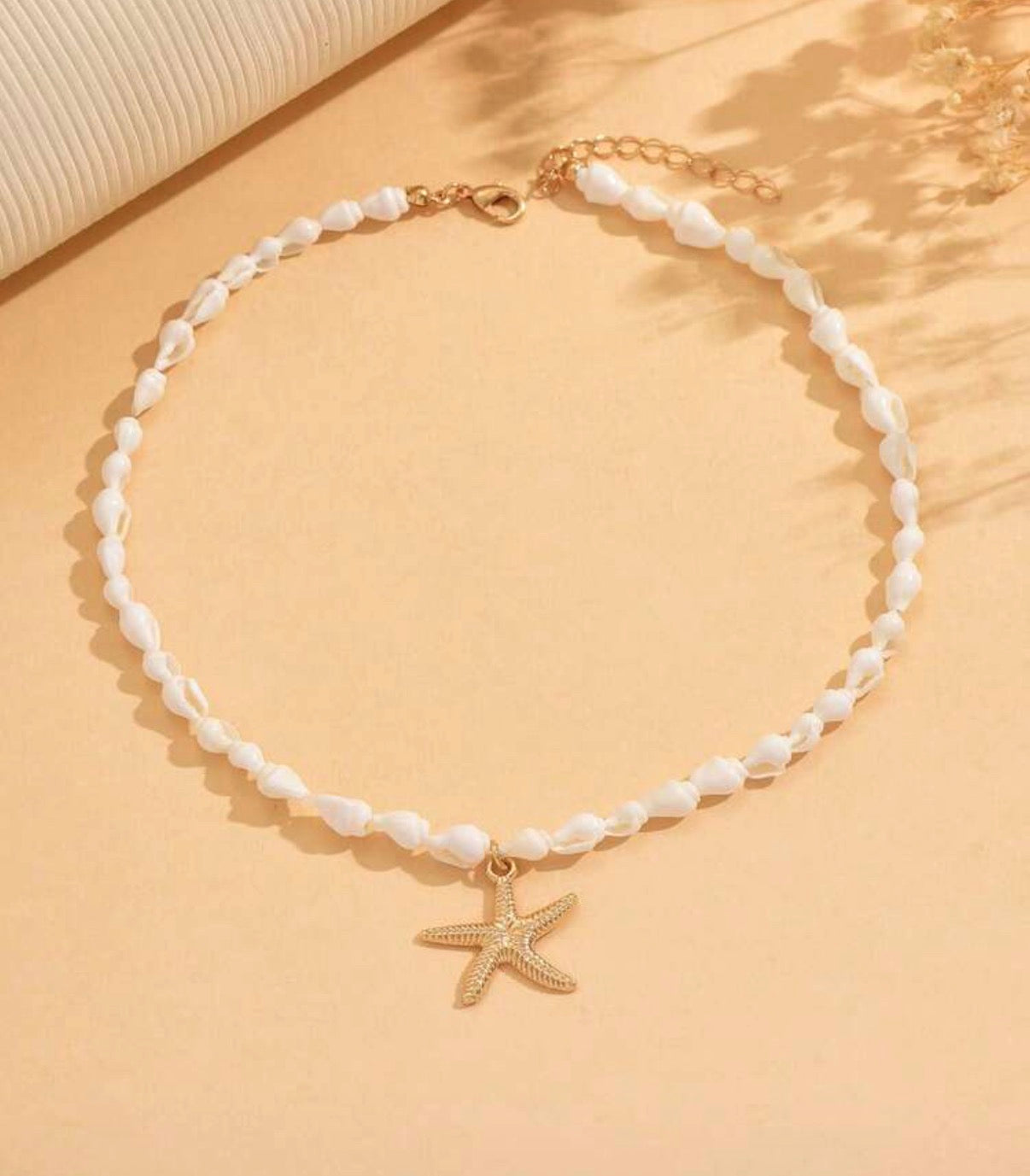 White Seashell Beaded Necklace with Gold Starfish Pendant
