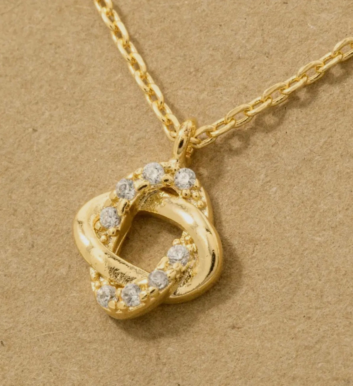 Gold Dipped Pave Double Knot
Pendant Necklace