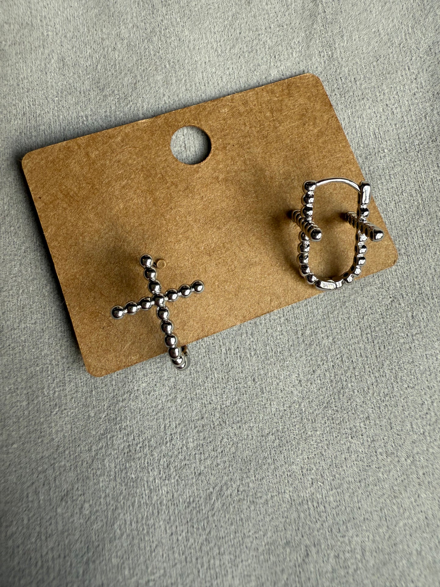 Double-Sided Silver Cross Huggie Hoop Earring.