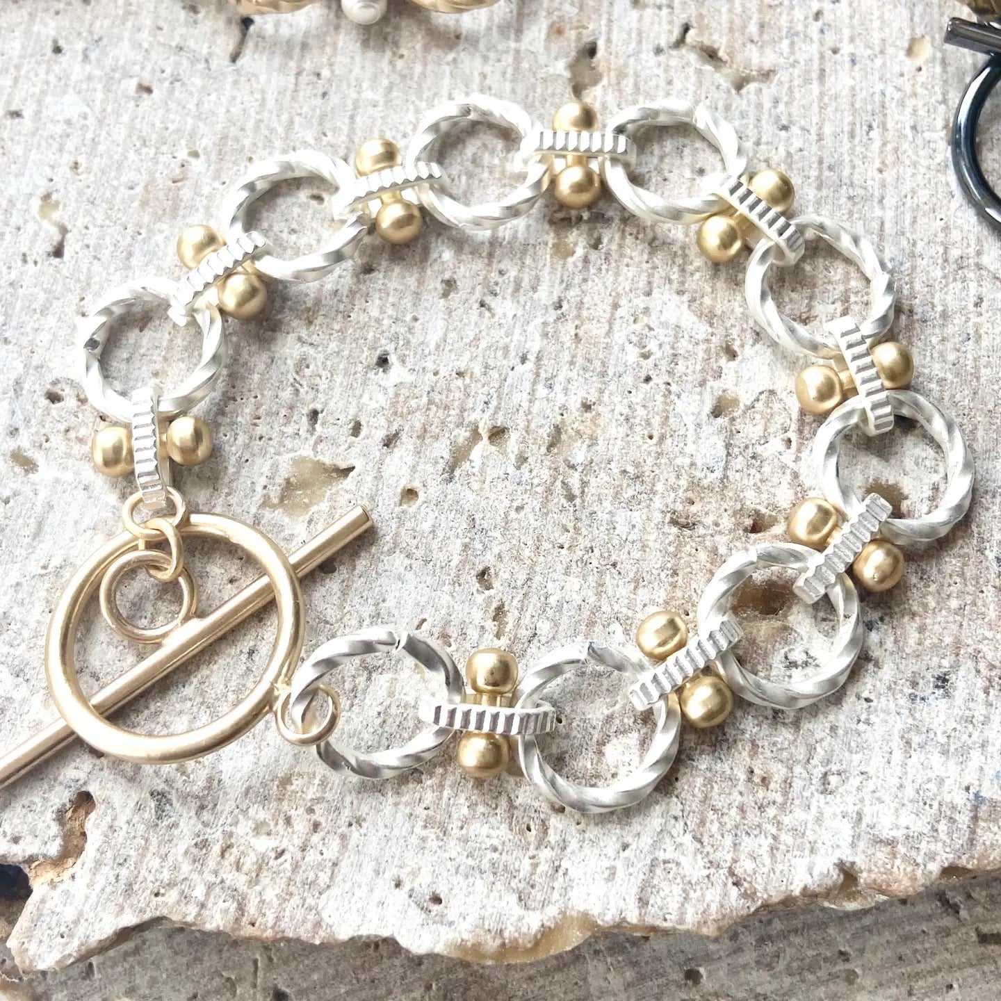 Two-Tone Toggle Chain Bracelet - Matte Silver with Gold Accents.