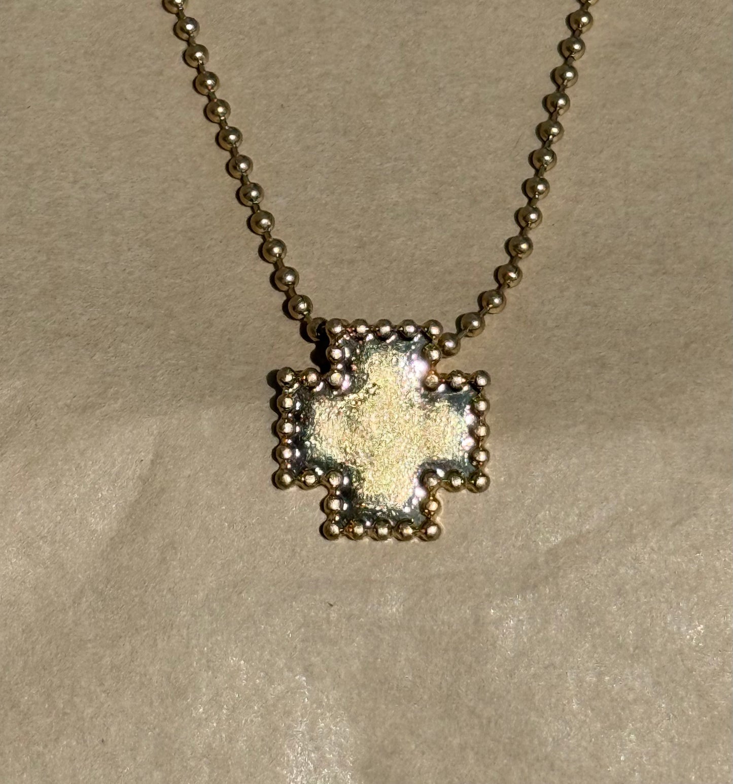 Worn Gold Ball Beaded Cross Necklace in Gold.