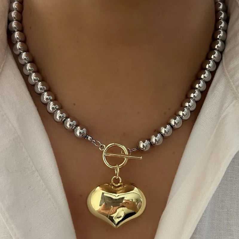 Two Tone/Mixed Metal Stainless Steel Ball Chain Necklace with Gold Heart Shaped pendant.