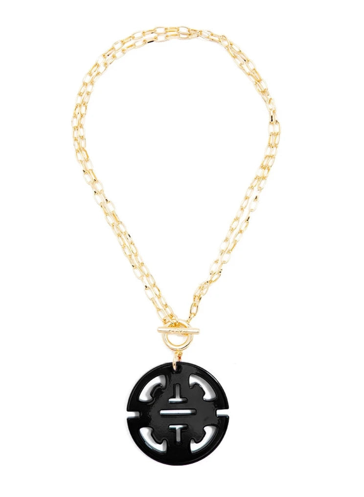 Black & Gold Traveling Resin Pendant Necklace