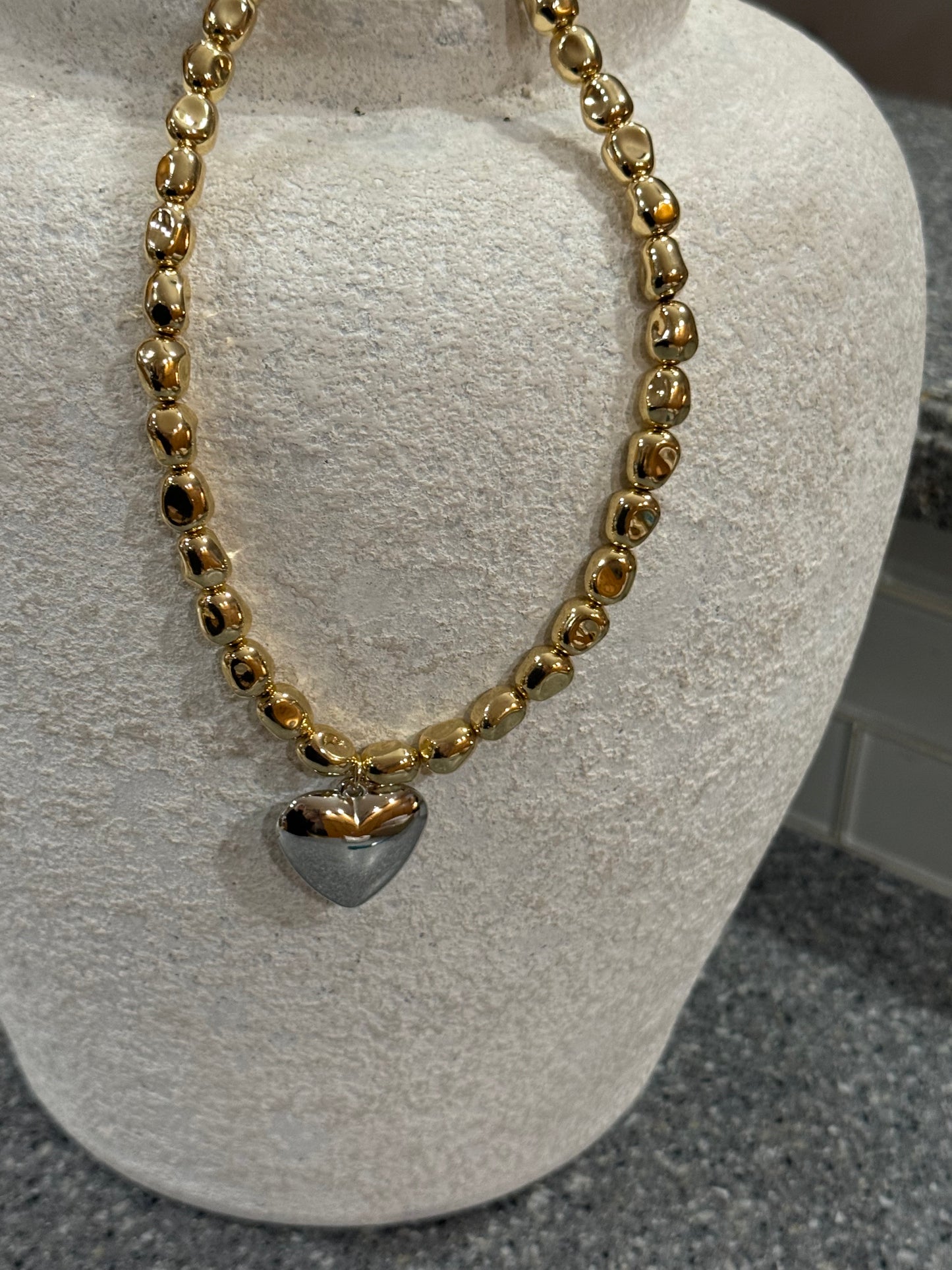 Bebe Hammered Gold Bead Necklace with Shiny Silver Heart Pendant