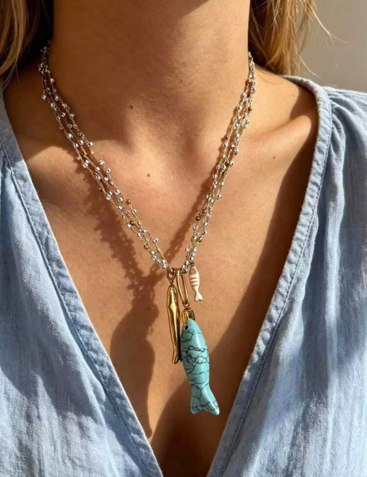 Two Tone, Multi- Layerd Beaded Necklace with 3 Fish Pendants