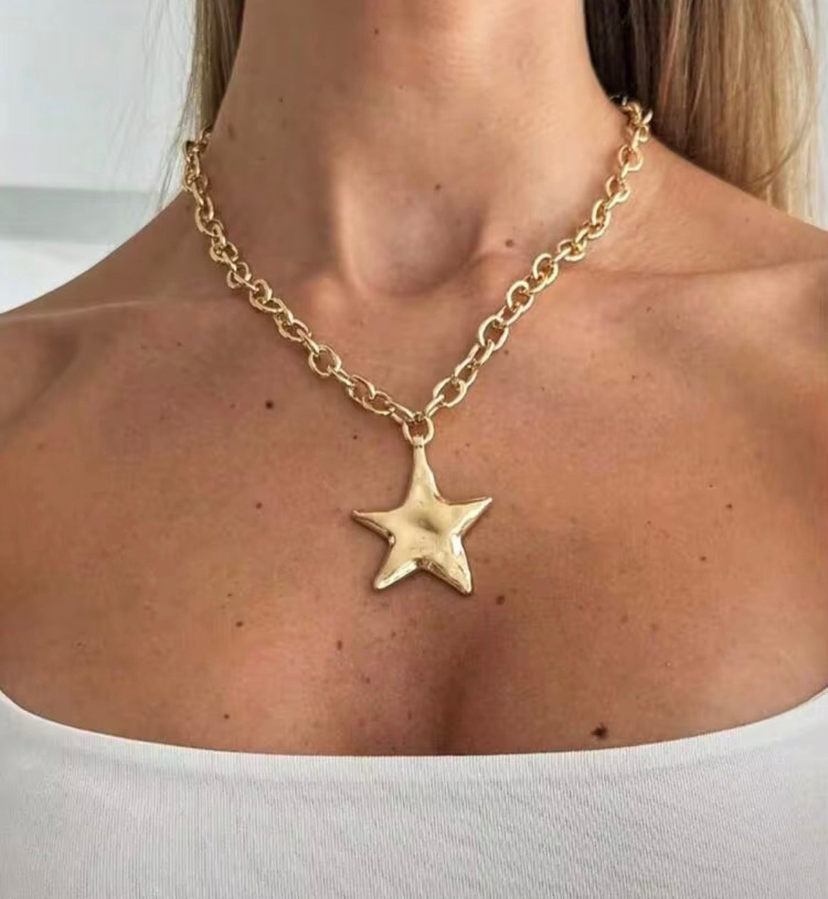 Gold Chain Necklace with 1.5” Gold Star Pendant.