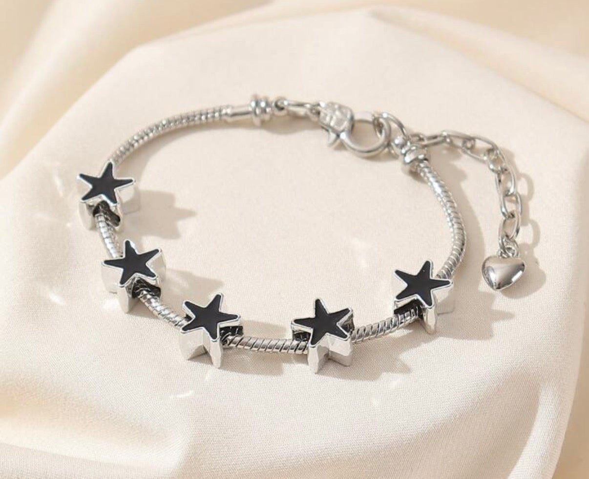 Silver Bracelet with Black & Silver Star Accents