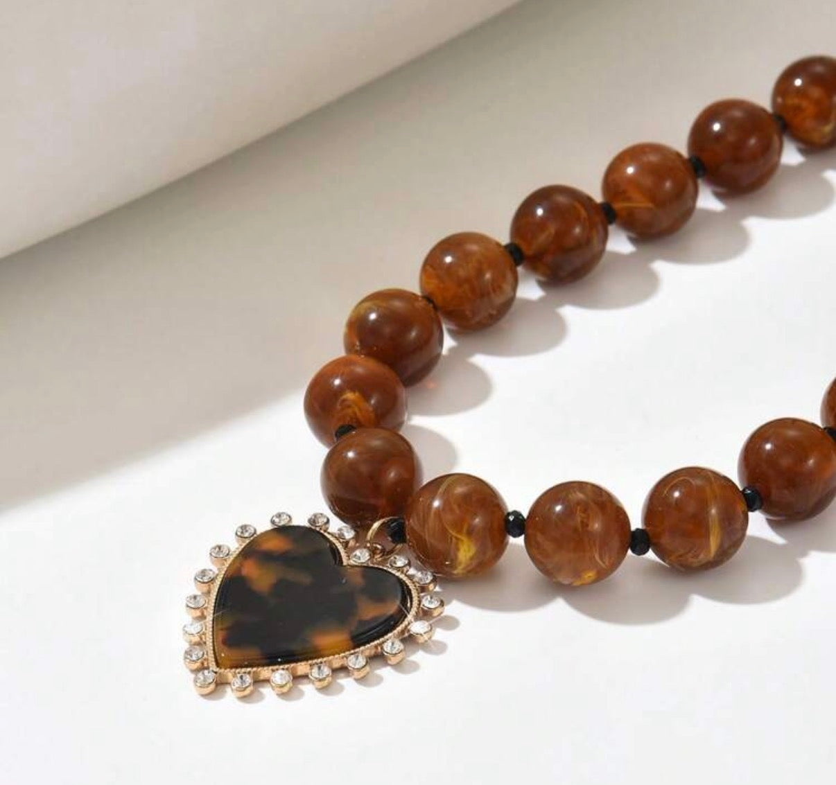 Brown Resin Beaded Necklace with Brown & Gold Spiky Heart Pendant