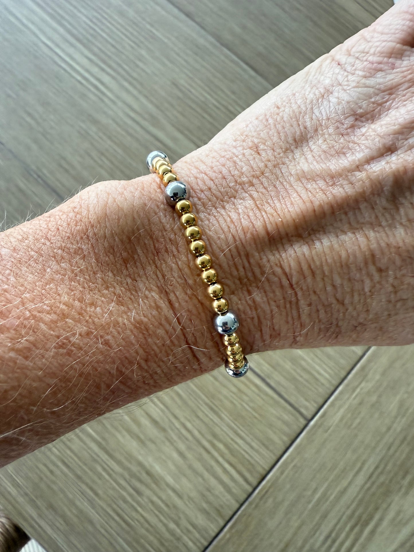 Two-Tone Gold Bead Bracelet with Silver Ball Accents
