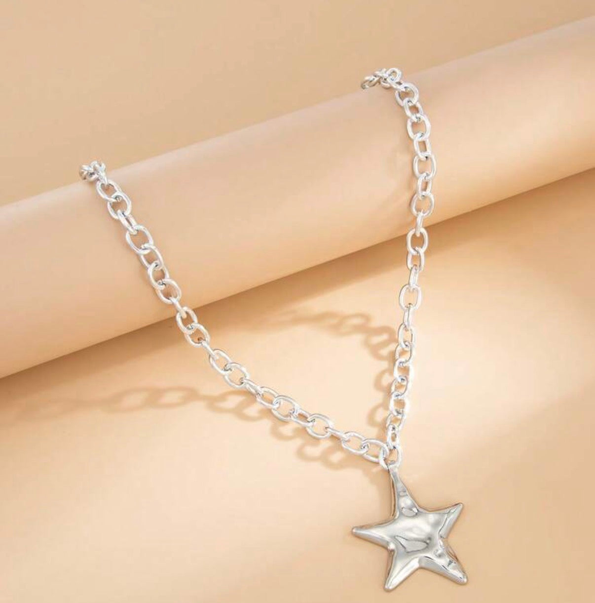 Silver Chain Necklace with 1.5” Silver Star Pendant.