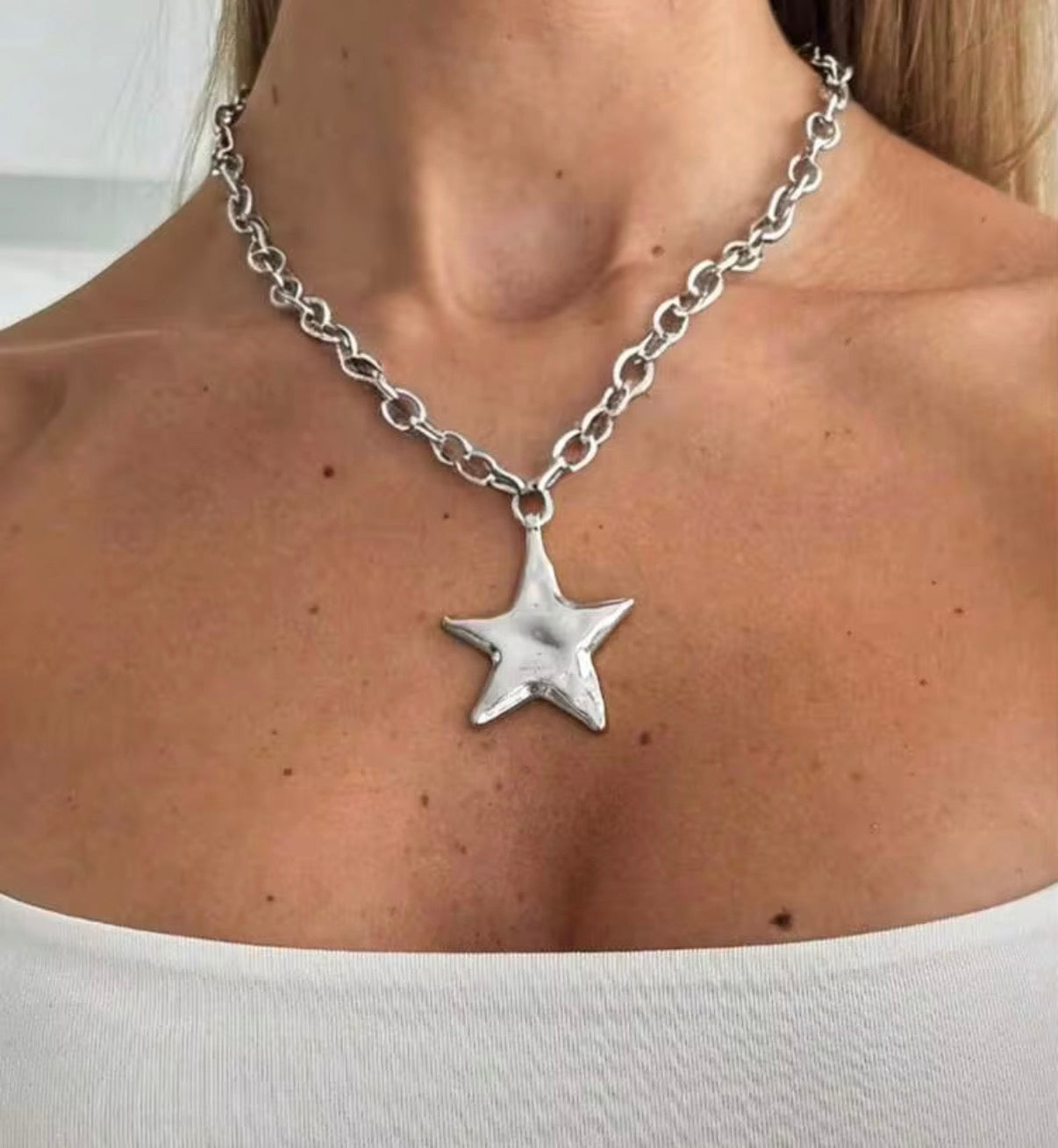 Silver Chain Necklace with 1.5” Silver Star Pendant.