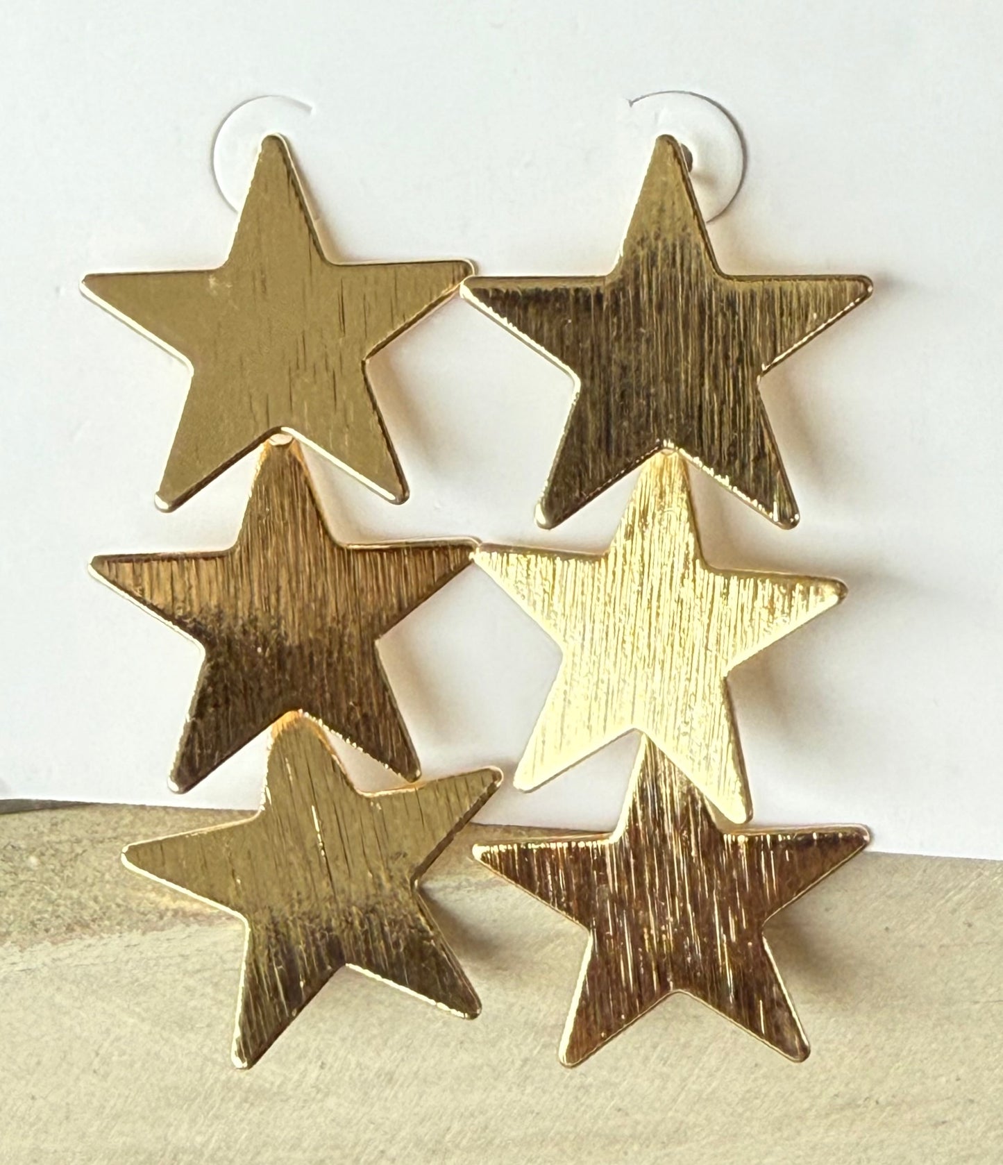 Gold Triple Star Dangle Earrings
