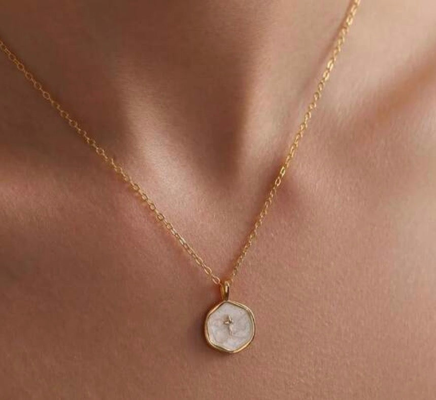 Delicate Gold Chain and Small White Pearl-like & Gold Disk Pendant with Tiny Gold Cross.
