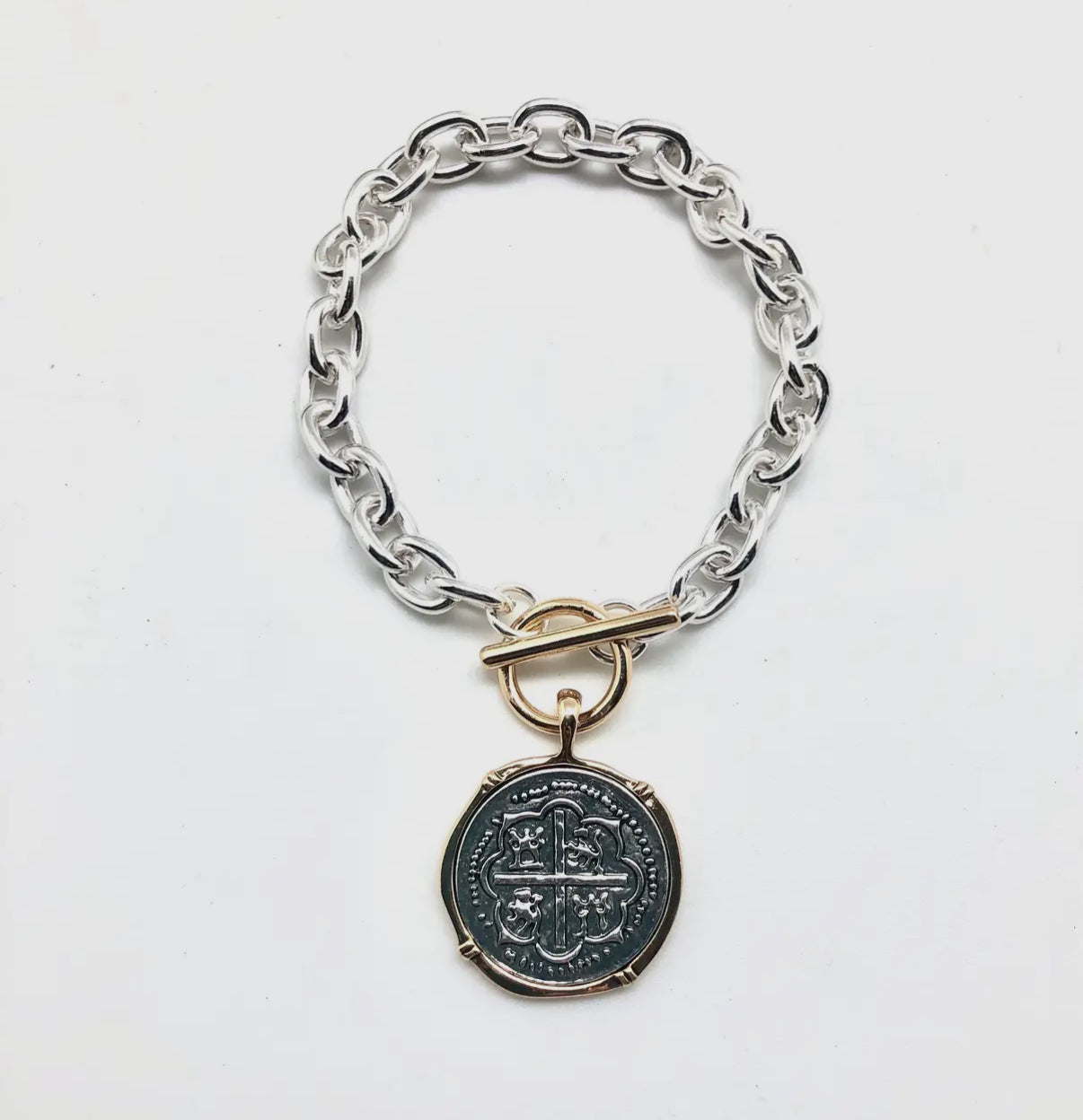 Two-Tone Chain Link Toggle Bracelet with Silver Coin Pendant Edged in Gold.