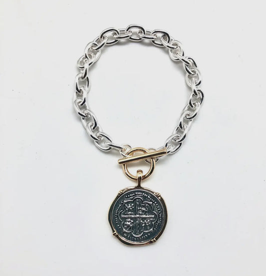 Two-Tone Chain Link Toggle Bracelet with Silver Coin Pendant Edged in Gold.