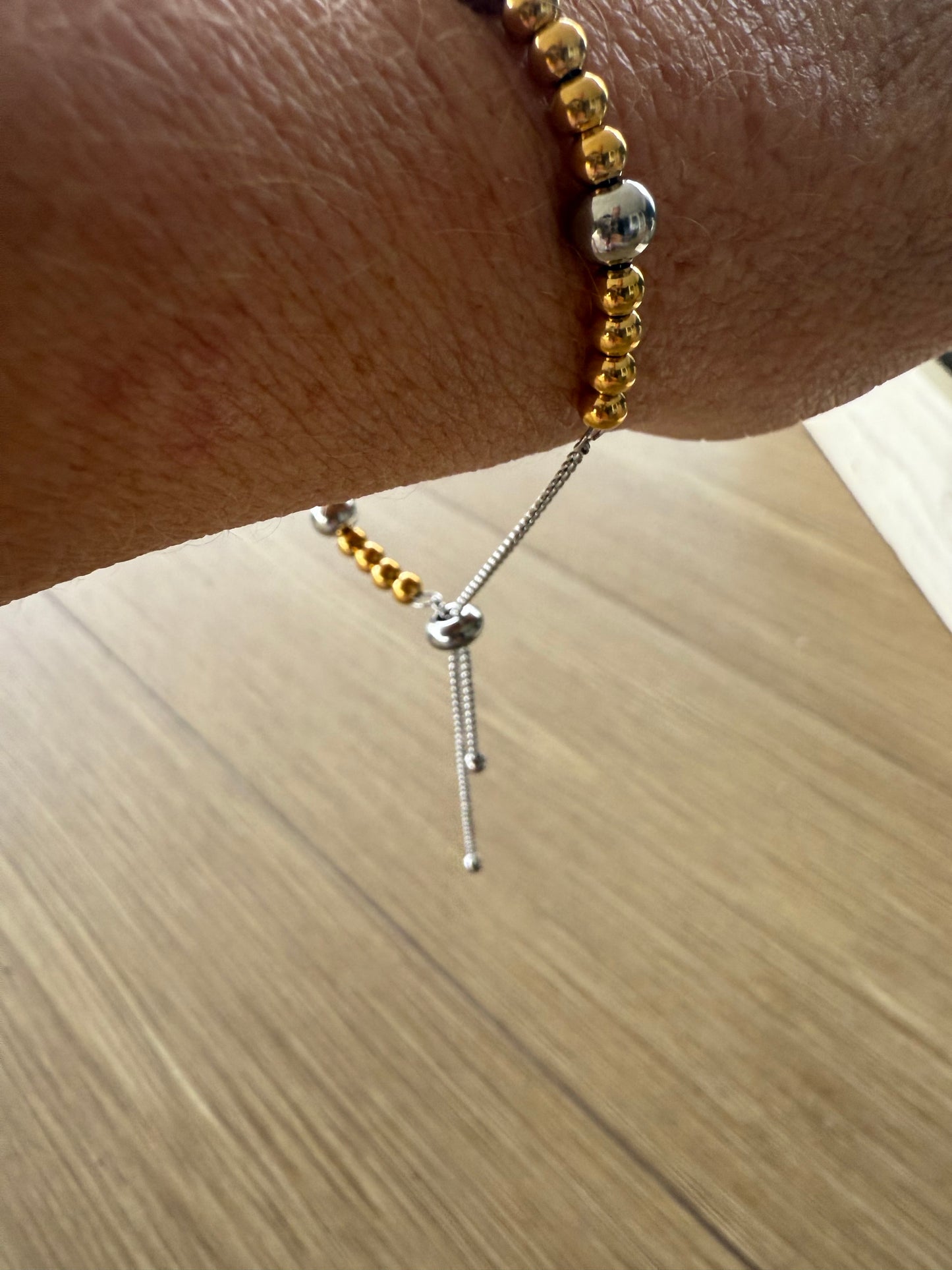Two-Tone Gold Bead Bracelet with Silver Ball Accents