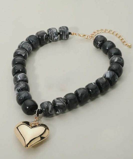Black Marbled Bead Necklace with Gold Puffy Heart Pendant