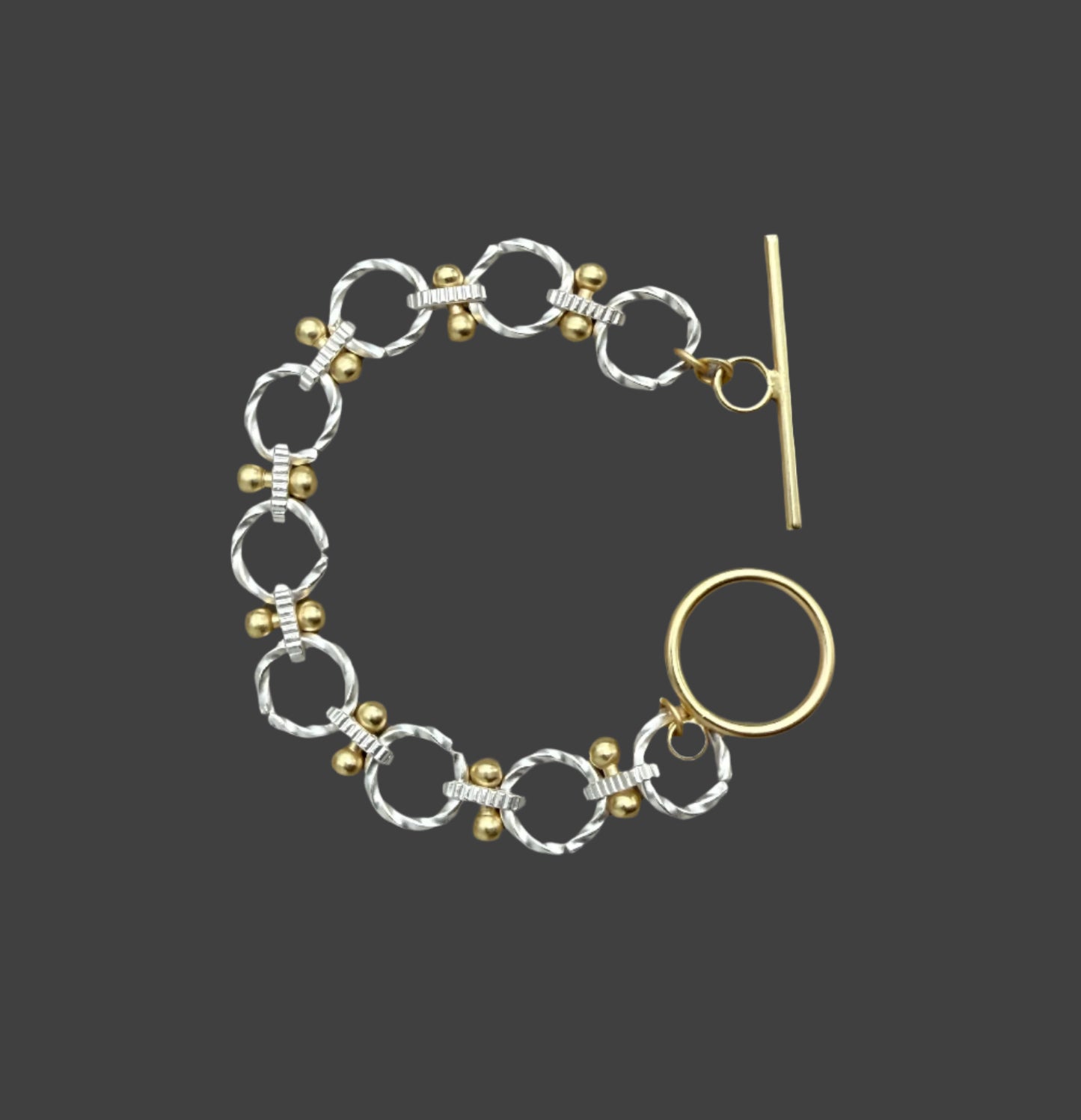 Two-Tone Toggle Chain Bracelet - Matte Silver with Gold Accents.