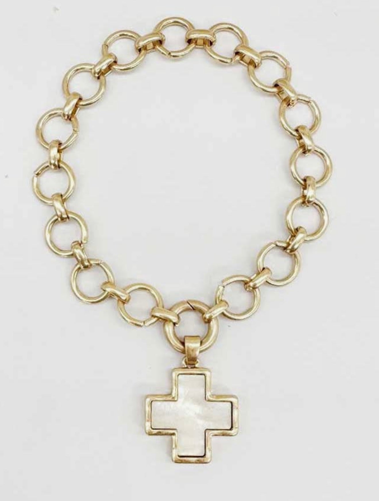 Worn Gold Open Circle with White and Gold Cross Charm Bracelet