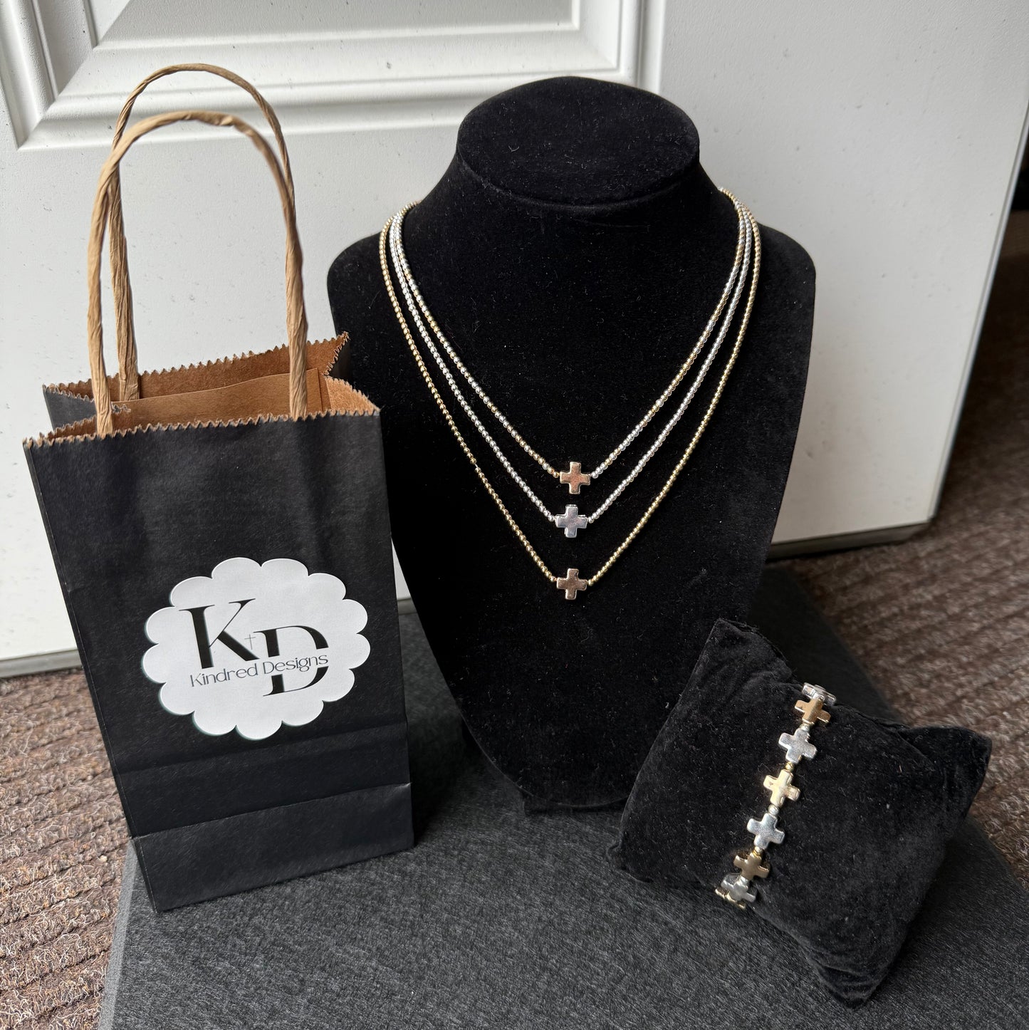 Two-Tone Small Ball Beaded
Necklace with Cross Accent