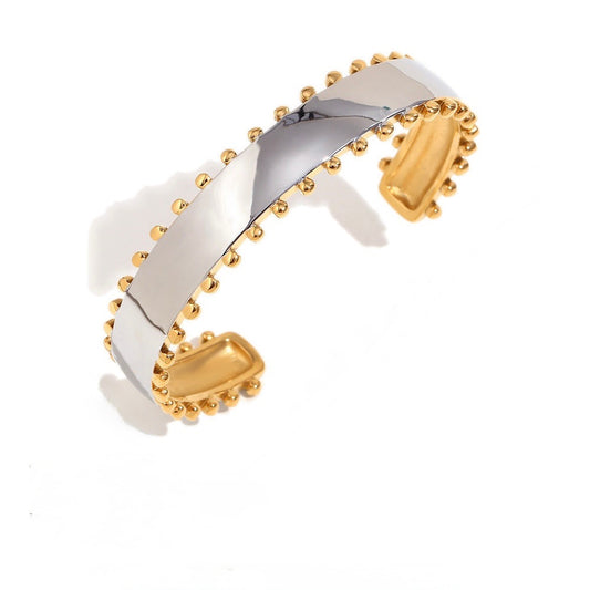 Two Tone/Mixed Metal Stainless Steel Cuff Bracelet with Gold Ball Edging.