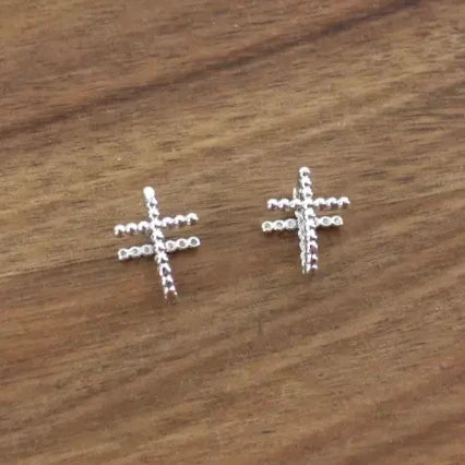 Double-Sided Silver Cross Huggie Hoop Earring.